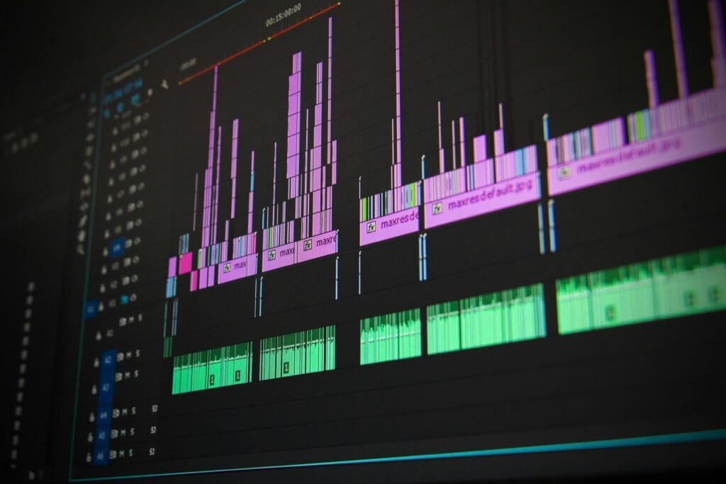 Close up of a professional audio and video editing software interface with waveform displays